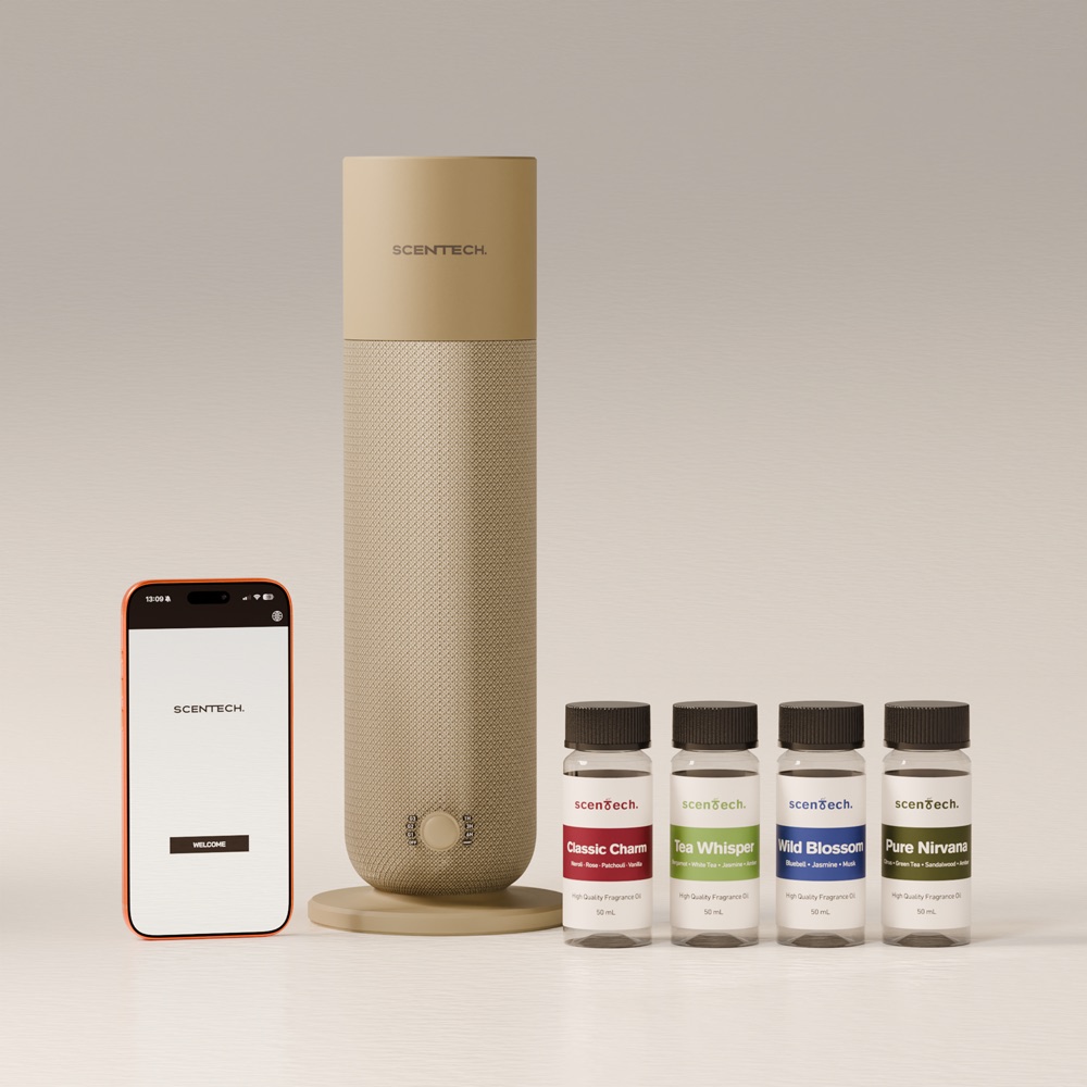 The Scentech Smart Aroma Diffuser 2 in taupe fabric, with a phone showing the Scentech app on the left and four scent refill bottles on the right